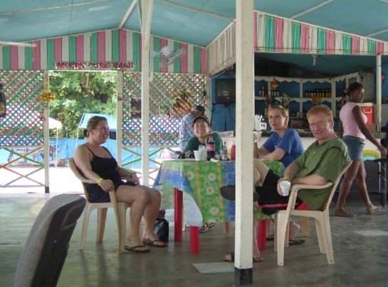 Guests resting together at a roadside café