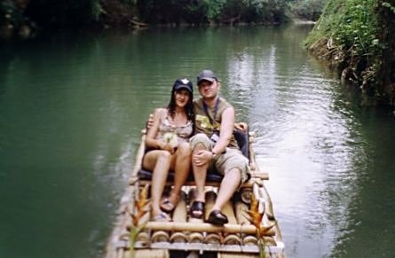 Two guests on a bamboo raft